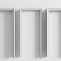 Three White Door Frames Side by Side Hung on Minimalist Wall 3d model