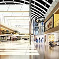 Spacious Shopping Mall Atrium with Glass Ceiling Natural Light Escalators and Brand Stores Display Windows