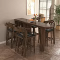 Modern Interior Featuring Wooden Bar Counter High Stools Fruit Bowl And Flowers