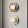 Modern Wall Lamps With Round Marble Base And White Spherical Bulbs On Light Gray Wall