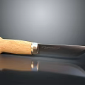 Sharp Hunting Knife With Wooden Handle And Metal Blade On Reflective Surface