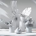 Elegant Glass And Black Vases With Tropical Leaves Calla Lilies And Pink Flowers