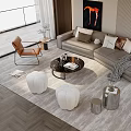 Modern Living Room Sofa And Coffee Table With Plush Pillows Textured Rug Accent Chair Artwork