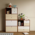 Brown White Beige Storage Cabinet with Drawers Open Shelves Table Lamp Plant Books Photo Frame