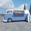 Vintage Blue and White Volkswagen Van Food Truck in Outdoor Waterfront with Black Tents