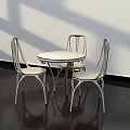 Modern Minimalist White Round Table And Three Metal Frame Chairs Set 3d model