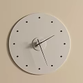 Minimalist White Dial Wall Clock With Black Dot Markers On Beige Wall
