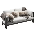 Modern Sofa With Plush Cushions Blanket Light Upholstery And Black Frame 3d model
