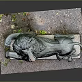 Reclining Lion Statue on Stone Plinth with Detailed Mane and Moss Accents