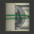 Rolled US Dollar Bills Secured With Green Rubber Bands On Dark Background