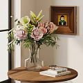 Pink And White Flower Bouquet In Clear Glass Vase With Book And Wall Artwork