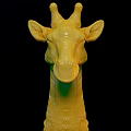 Yellow Giraffe Head Sculpture Decorative Art Piece On Black Background