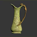 Green Ceramic Jug With Golden Decorative Handle And Patterned Surface 3d model