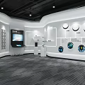 Modern Exhibition Hall With White Wall Circular Displays Digital Screens And Control Consoles