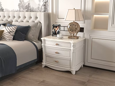 White Three Drawer Bedroom Bedside Table With Gold Base Lamp Photo Frame And Cup 3d model
