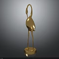 Golden Crane Sculpture With Shiny Surface And Circular Base On Dark Background
