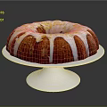 Delicious Round Bundt Cake With White Icing Drizzle On Silver Stand Against Dark Background