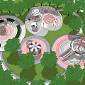 Colorful Children's Play Area Surrounded by Green Trees With Circular Structures And Slide