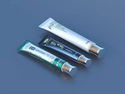 Three Daily Necessity Tubes in Different Colors with Golden Caps on Surface 3d model