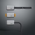 Three Contemporary Electrical Control Devices With Gray Bodies Orange Accents And Connection Cables