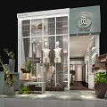 Modern Clothing Store With Elegant Window Display Mannequins Green Plants And Decorative Entrance