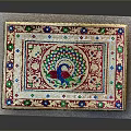 Decorative Colorful Outdoor Table With Peacock Design Gold Accents And Intricate Patterns