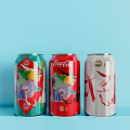 Colorful Beverage Cans In Green Red And White On Light Blue Background