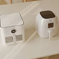 Modern White Kitchen Appliances Two Air Fryers With Transparent Window And Digital