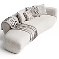 Modern Beige Upholstered Sectional Sofa With Patterned Pillows And Fringed Throw Blanket 3d model