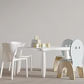 Modern Kids Table With White And Blue Chairs Stacked Wooden Blocks