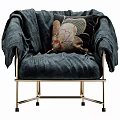 Dark Blue Velvet Armchair with Brass Metal Frame and Decorative Floral Pattern Pillows