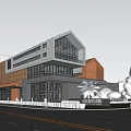 Modern School Building Exterior With Glass Windows Brick Red Accents And Landscaped Area