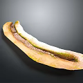Delicious Long Baked Pastry With Green Topping And Brown Filling Snack