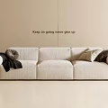 Modern Minimalist Cream Fabric Three Seater Sofa With Decorative Pillows And Soft Throw Blanket