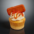 Delicious Cupcake With Creamy Vanilla Frosting Red Swirl Decoration And Crispy Cookie Topping