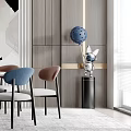 Modern Restaurant Interior With Round Dining Table Brown Blue Chairs Black Pendant Light And Bookshelf