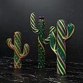 Colorful Striped Cactus Decorations for Window Display Visual Merchandising