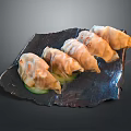 Delicious Steamed Dumplings Arranged On Dark Plate With Fresh Cucumber Slices