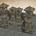 Traditional Stone Lanterns with Carved Bases and Ornate Roofs as Garden Ornaments on Paved Ground