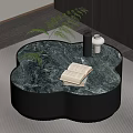 Elegant Modern Clover Shaped Coffee Table With Marble Top Book Vase And Green Plant
