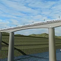 Bridge With High Speed Train Over River And Cargo Ship Near Mountains And Farmland