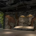 Industrial Interior Space Featuring Circular Stone Wall With Golden Statue And Green Plants