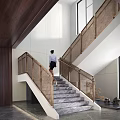 Elegant Modern Staircase Interior With Marble Steps Brass Railings And Natural Light