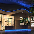 Modern Plant Exhibition Hall Interior With Glass Display Cases Blue Lighting And Green Decor