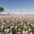 Scenic Post Station Amid Pink Flower Field Featuring White Building Tree Sculptures And Blue Sky