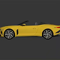 Yellow Sporty Convertible Car With Black Soft Top And Sleek Exterior