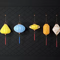 Five Lanterns of Various Colors and Shapes Hanging On Black Grid Background