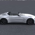 White Convertible Sports Car With Sleek Front Design And Green License Plate