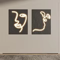 Modern Wall Decor Set of Two With Glowing Line Art Face Silhouette On Black Background