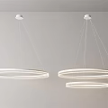 Elegant Modern Circular Pendant Lights Featuring Multiple Hanging Rings On White Ceiling 3d model